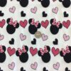 Minnie Mouse Heads wearing bows on White Cotton Lycra